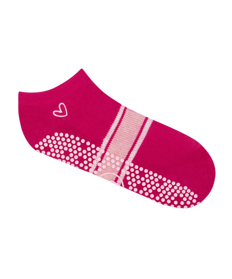 Comfortable and stylish low rise grip socks in fuchsia stripes